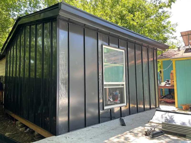 Black standing seam metal wall panels for Roof Inspection in Kemp Mill