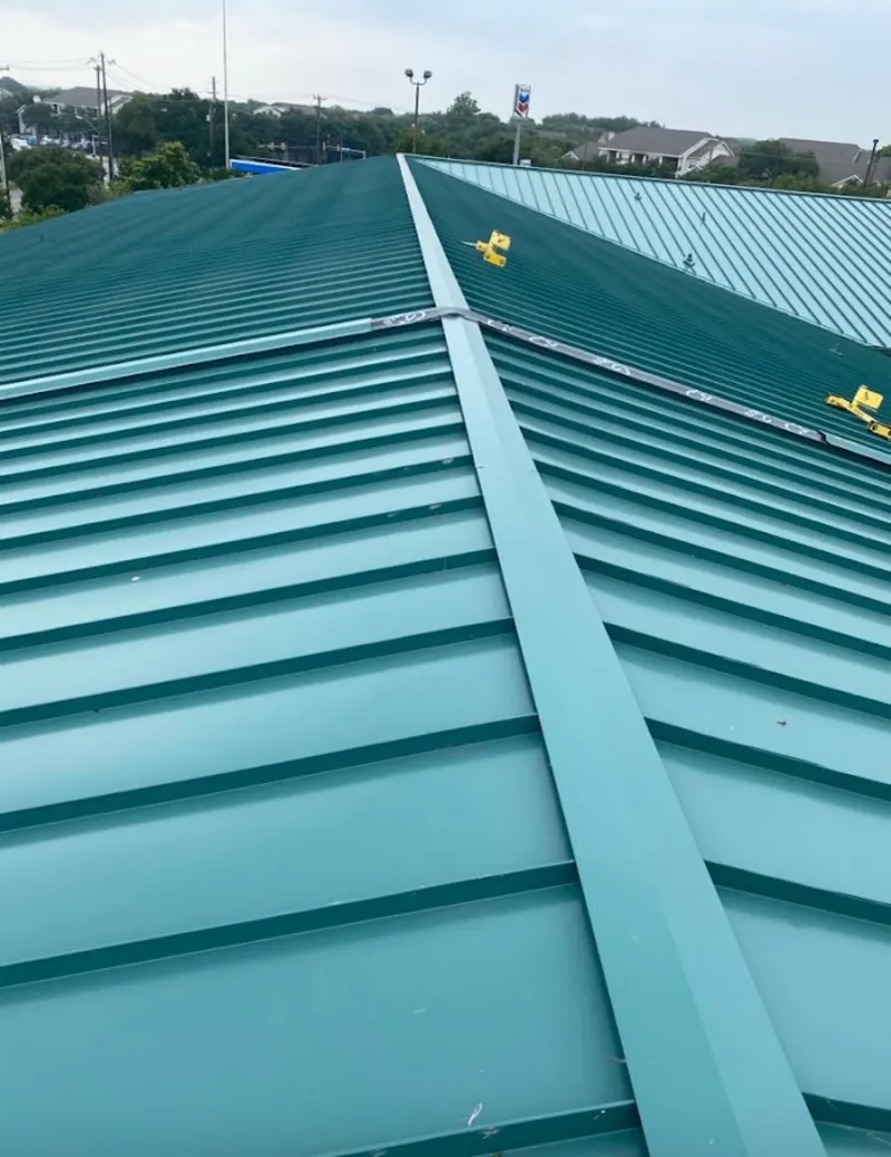 Green commercial metal roof ridge and valley for Metal Roof Repair in Kemp Mill